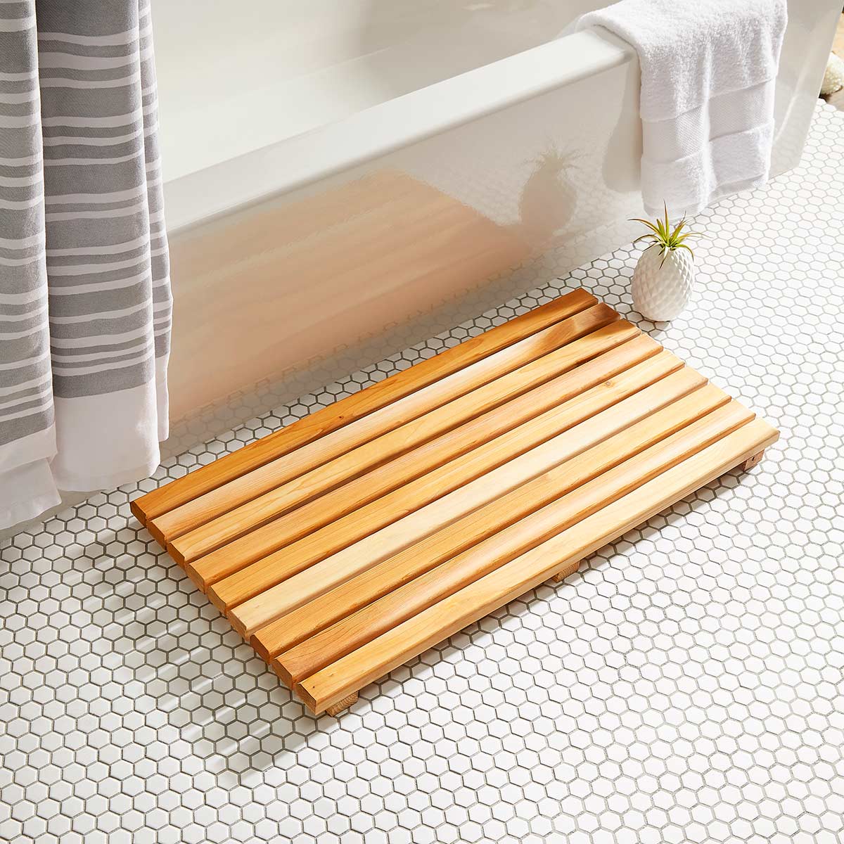 wooden bathmat made from plyco's bamboo plywood