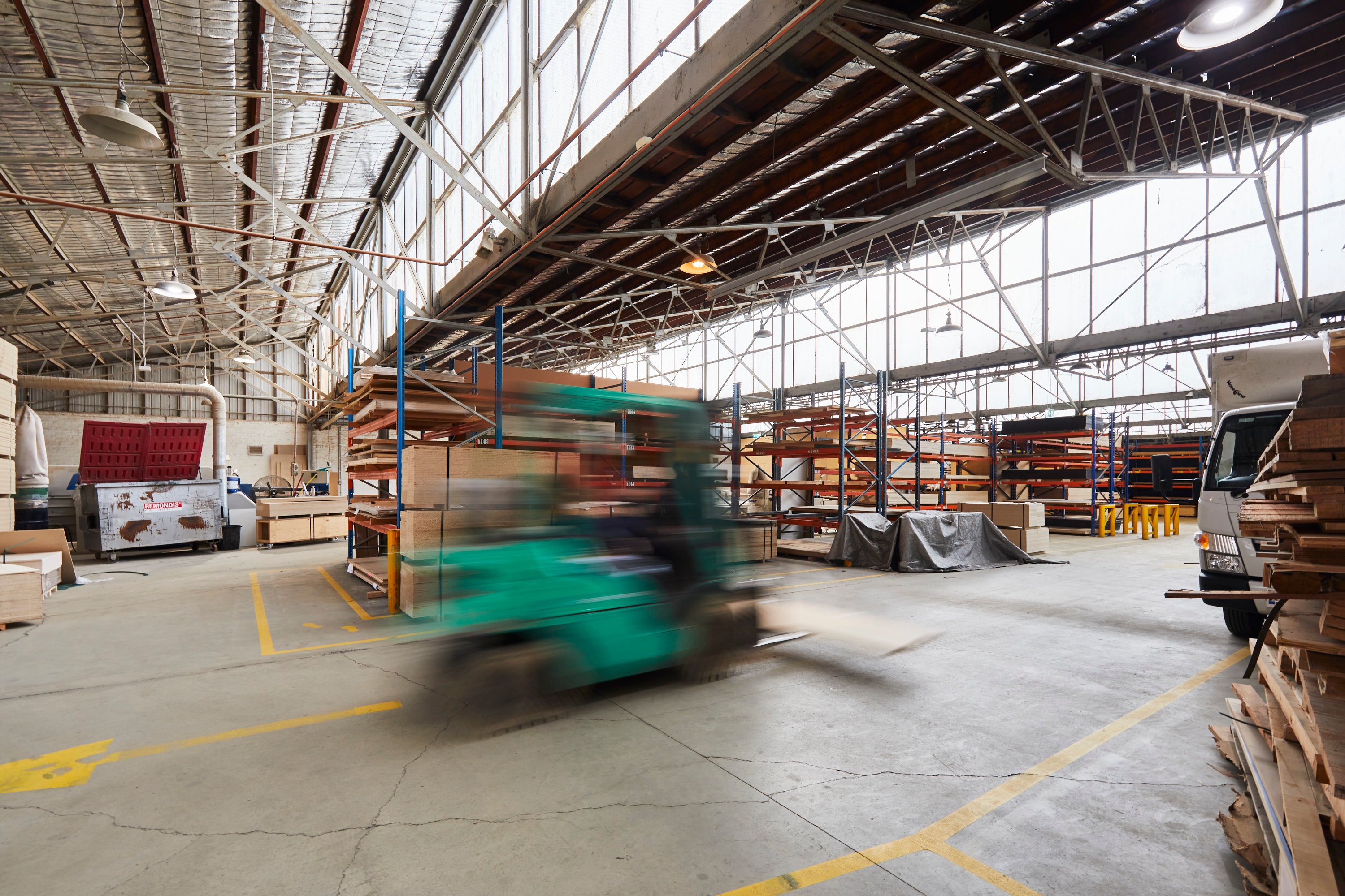 Forklift carrying a customer's plywood order at our Fairfield factory in Melbourne