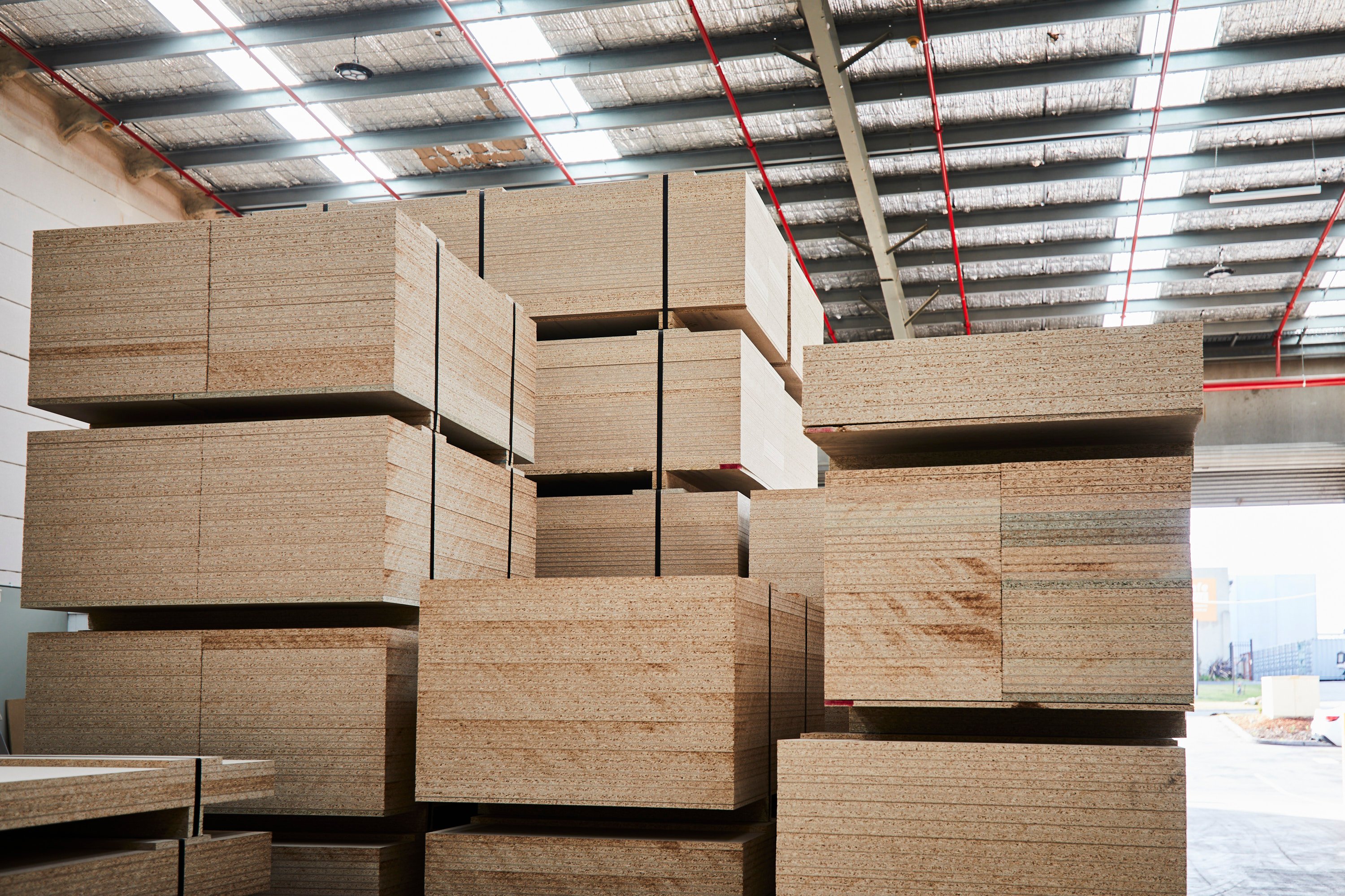 Particleboard sheets piled to the rafters at Plyco Mornington