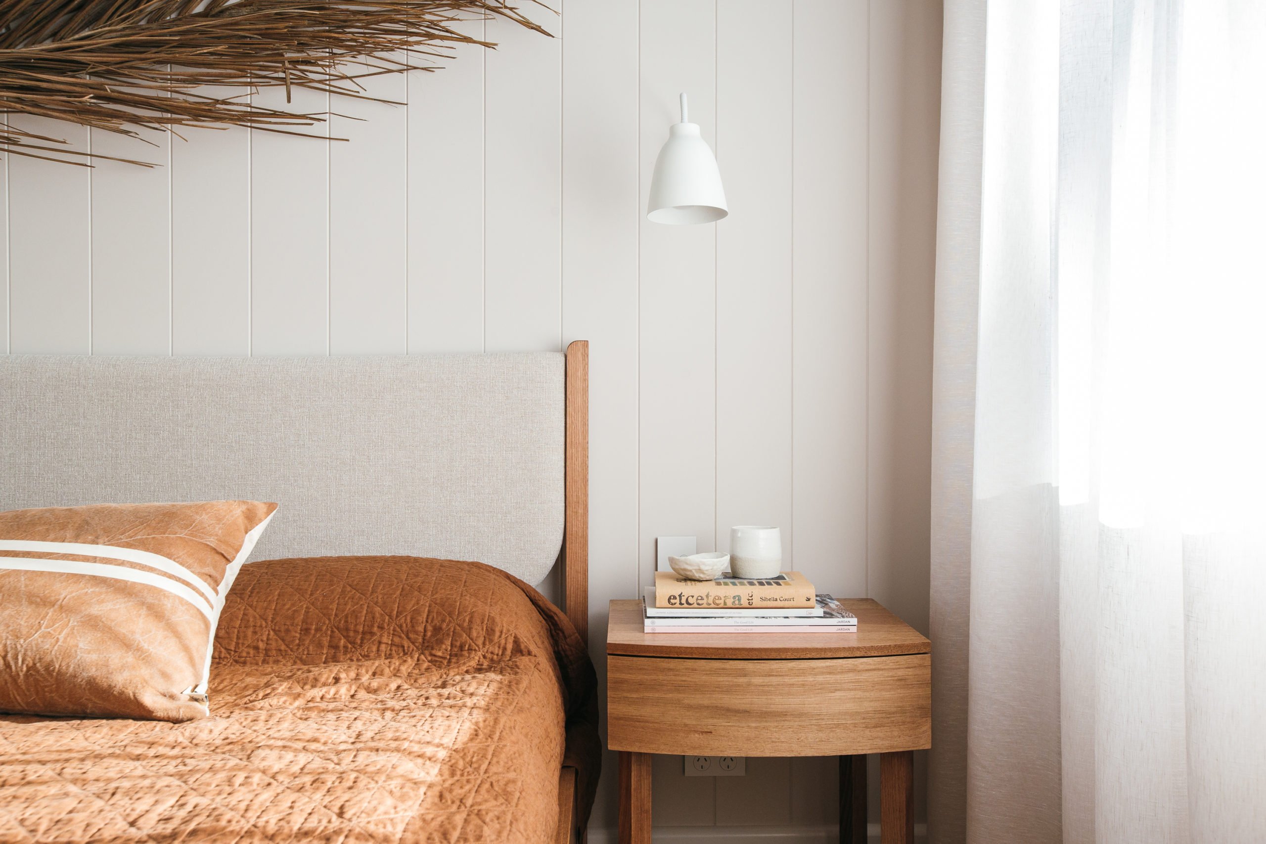 Plyco's EasyVJ100 wall panelling used in a modern, rustic bedroom